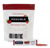 POSSIBLE Pre-Workout Strawberry Beet resealable pouch with a single-serving stick pack and powdered supplement displayed alongside fresh strawberries and beets