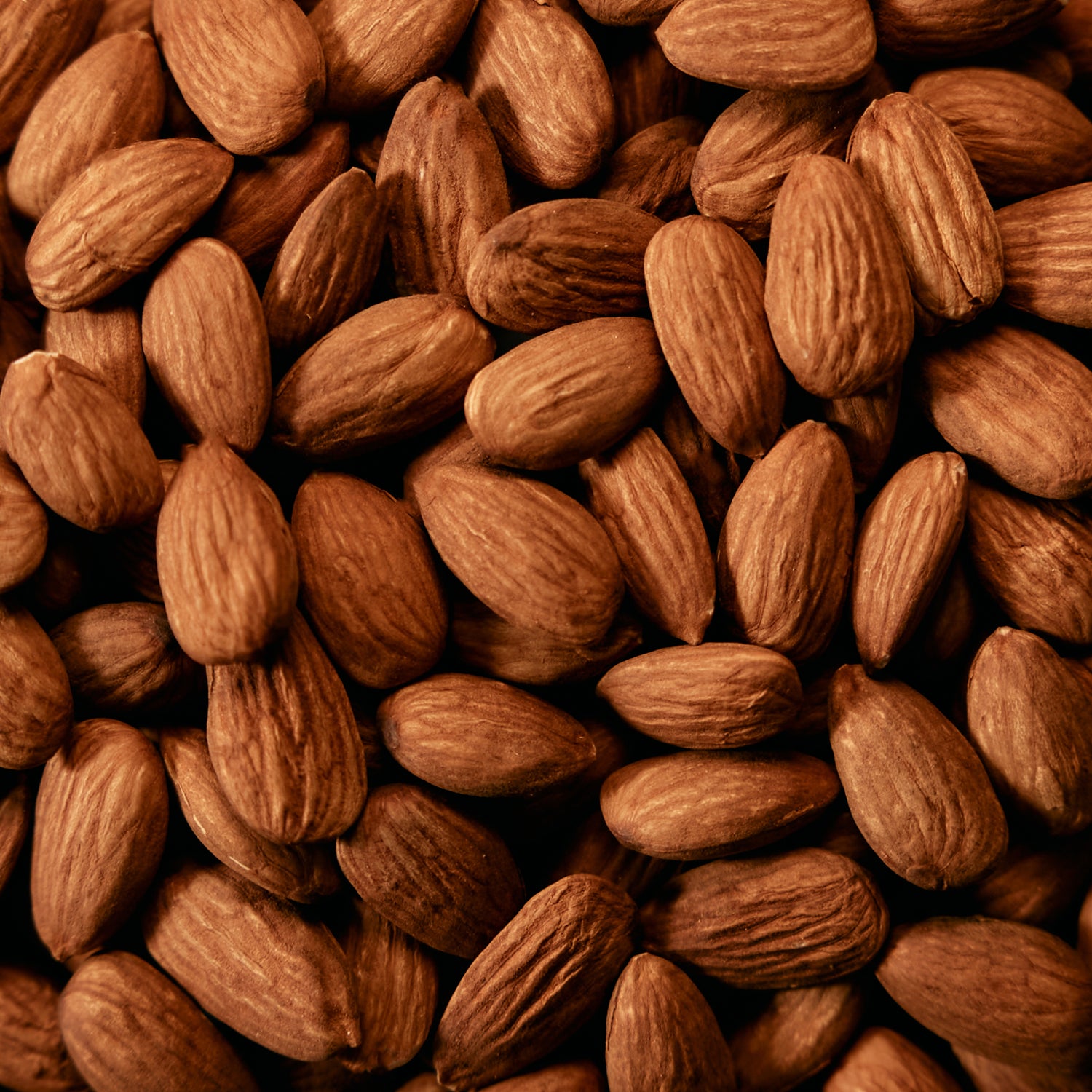 POSSIBLE Close-up of almonds, a protein-rich ingredient in POSSIBLE Strawberry Beet Almond Snack Bar, providing healthy fats and essential nutrients.